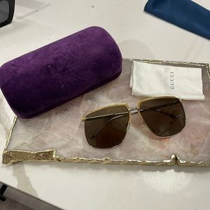 Gucci sunglasses with case and cleaning cloth, silver and gold design